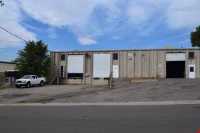 2,000 SF warehouse with dock high loading (drive in access potential)