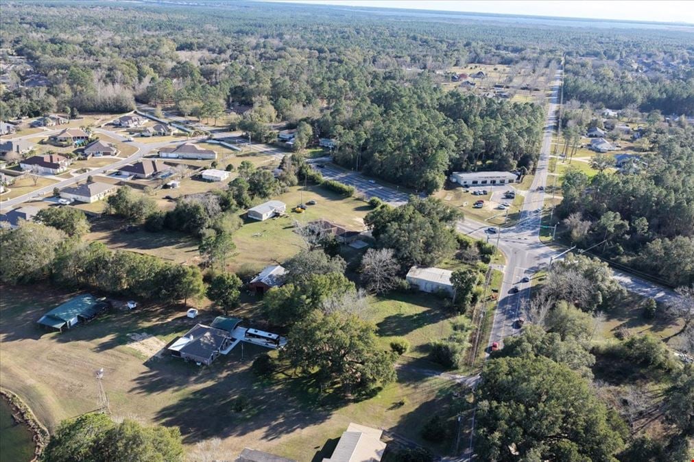 7998 Mobile Hwy | Signalized Hard Corner For Sale