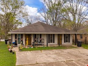 Renovated, Cash-Flowing Duplex near Upcoming Developments