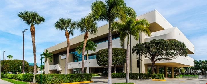 Boutique owner-user office building with oversized balconies and garage parking in North Palm Beach, FL