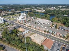 Prime Riverfront District Land + Building