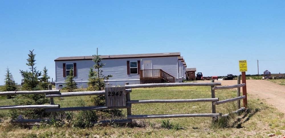 5 ACRES WITH 5 APPROVED MANUFACTURED HOMES