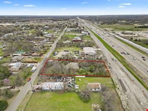 High-Traffic Mixed Use/Land Near I-35 – Owner Finance! Prime Development Opportunity!