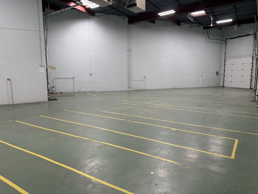 Load under roof: the truck pulls inside the building