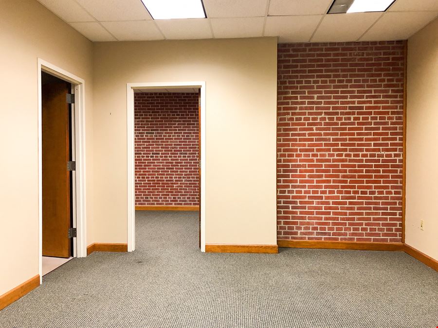 New Price: Gras Town Plaza - Office Building & Parking Lot in Downtown