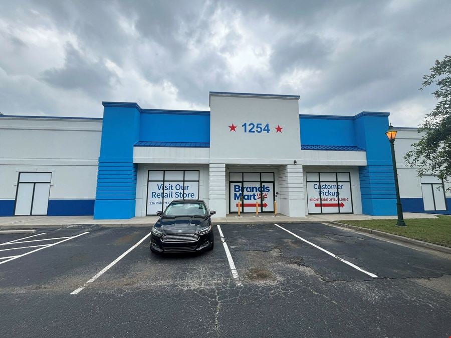 BrandsMart Warehouse (Vacant) & Billboard