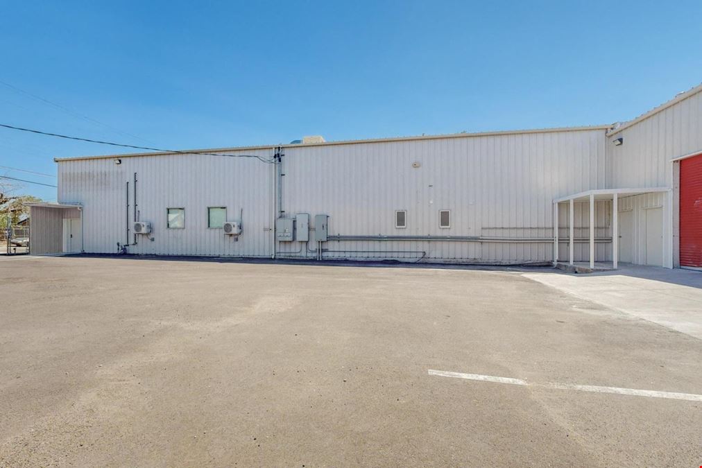 Newly Updated Clearspan Warehouse with Gated & Paved Yard near Big I