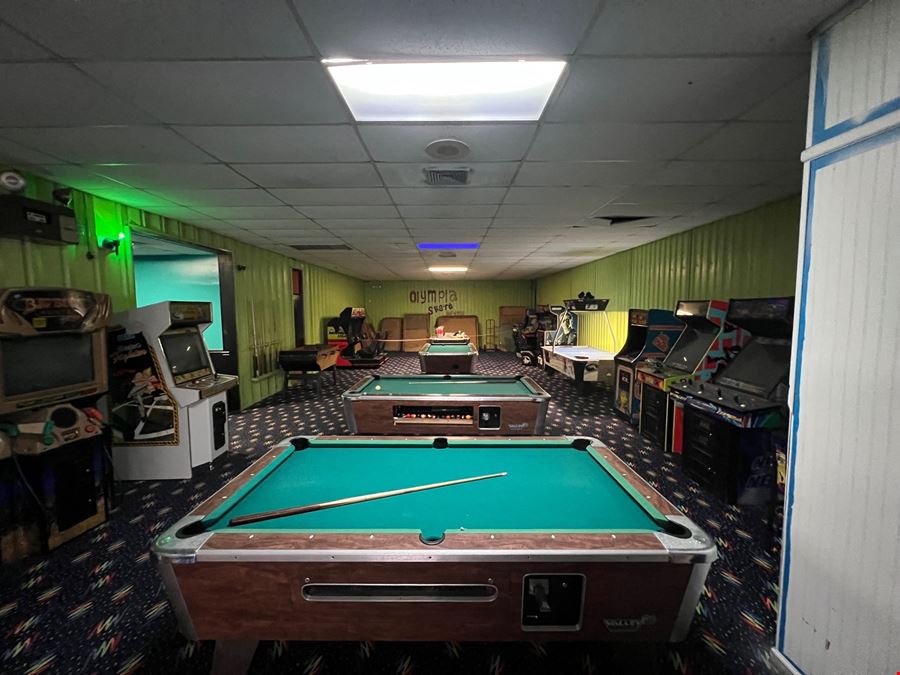 Former Roller Skate Rink Warehouse Building