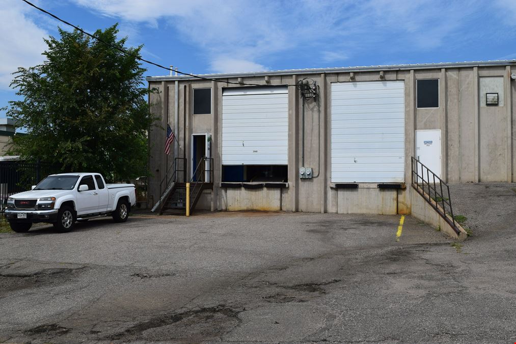 2,000 SF warehouse with dock high loading (drive in access potential)