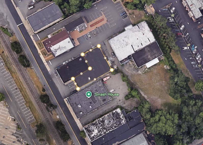 711 Broadway Industrial Trade Building with In-Place Dry Cleaner Income