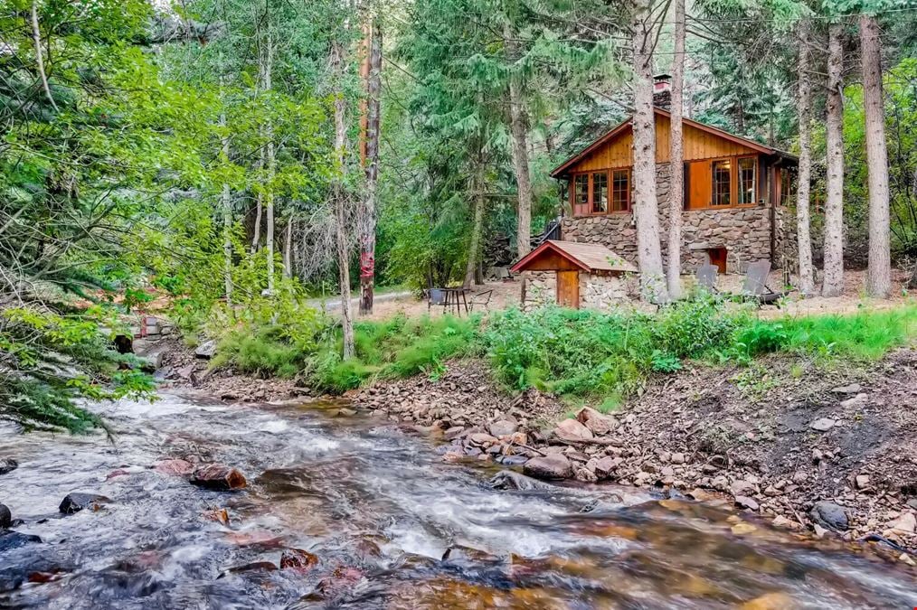 Water & Stone Cabins | 14-Keys | C-3 Zoning | Live Creek Frontage | 6.7 CAP