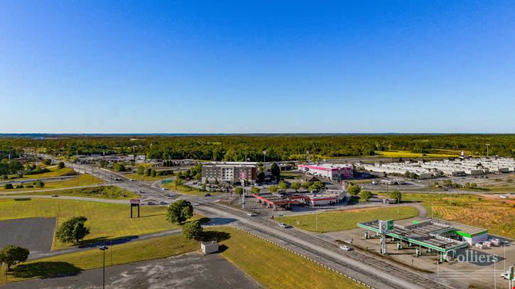 Investment Opportunity with Existing Ground Lease at Signalized Intersection, Just Off I-85