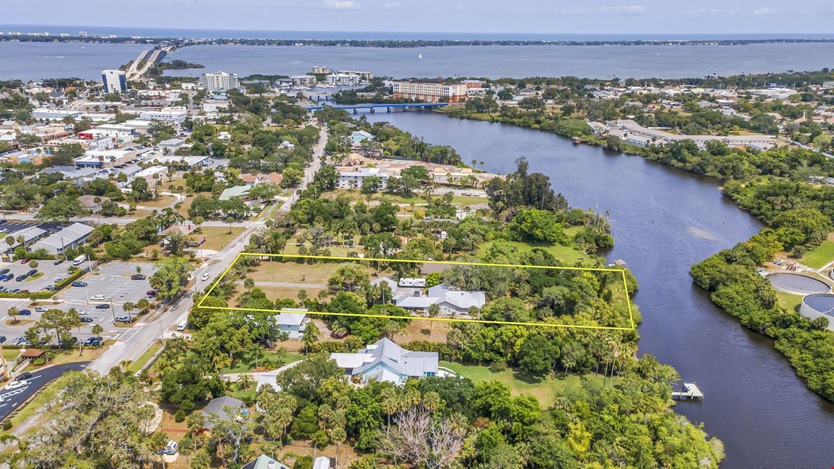 THE 2.08 ACRES OF MULTI-FAMILY LAND IMPROVED WITH SINGLE-FAMILY HOMES