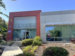 1987 Leghorn Street, Suite 100