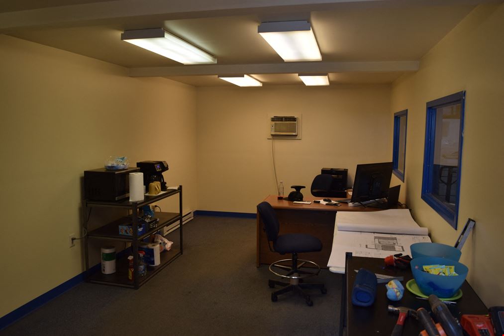 2,000 SF warehouse with dock high loading (drive in access potential)