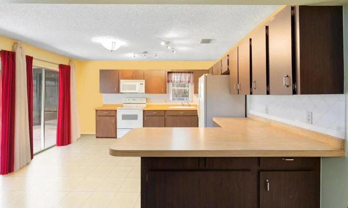 5-Unit Quadplex + Laundromat Income Property
