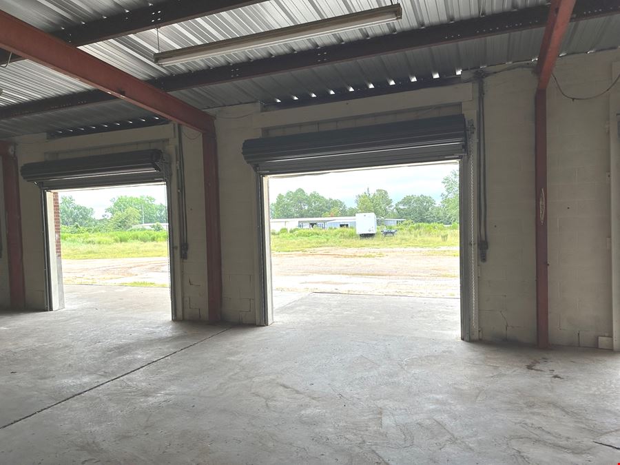 6.68 acres of Industrial Outdoor Storage (IOS) w/ Warehouse