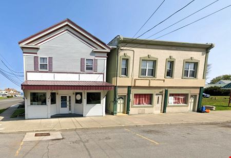 Preview of Retail space for Sale at 5959 E. Main Street & 1543 Lockport St