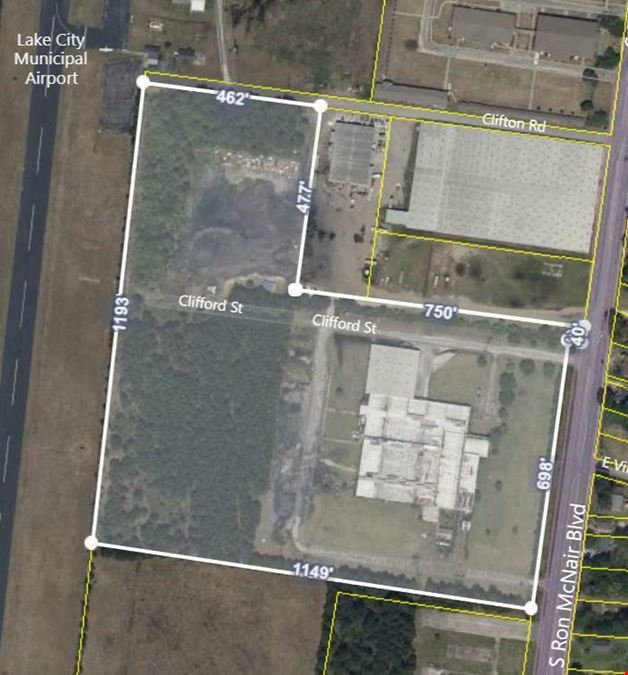 Former Talon Zipper Manufacturing/Warehouse - 105,251 SF - Adjacent to Runway with Potential IOS Land - 20 +/- Acres - Opportunity Zone