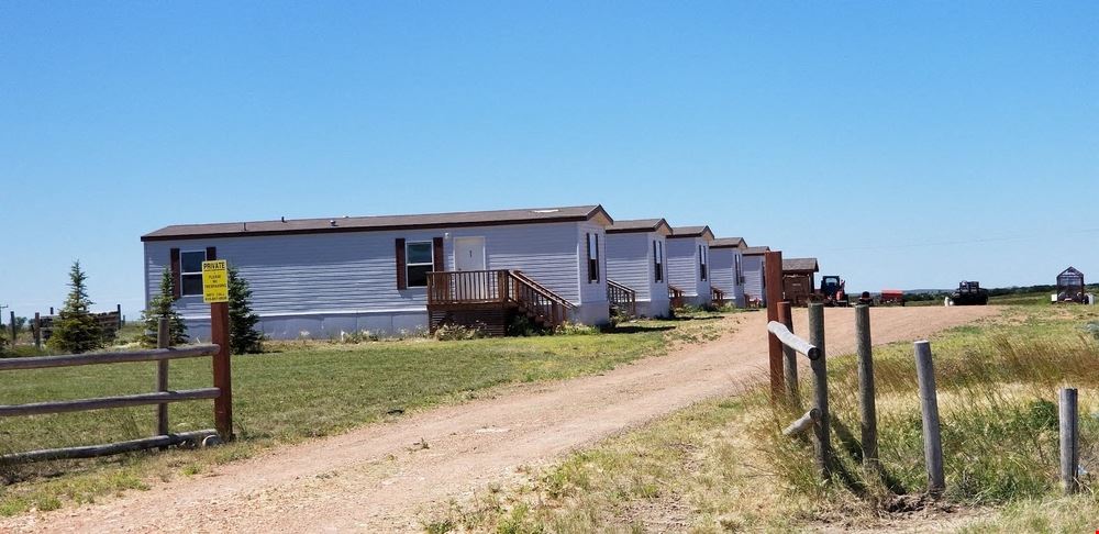 5 ACRES WITH 5 APPROVED MANUFACTURED HOMES