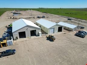 ±14,030 SF Industrial Building(s)  | 3 Building(s) | ±14 Acre Stabilized Yard