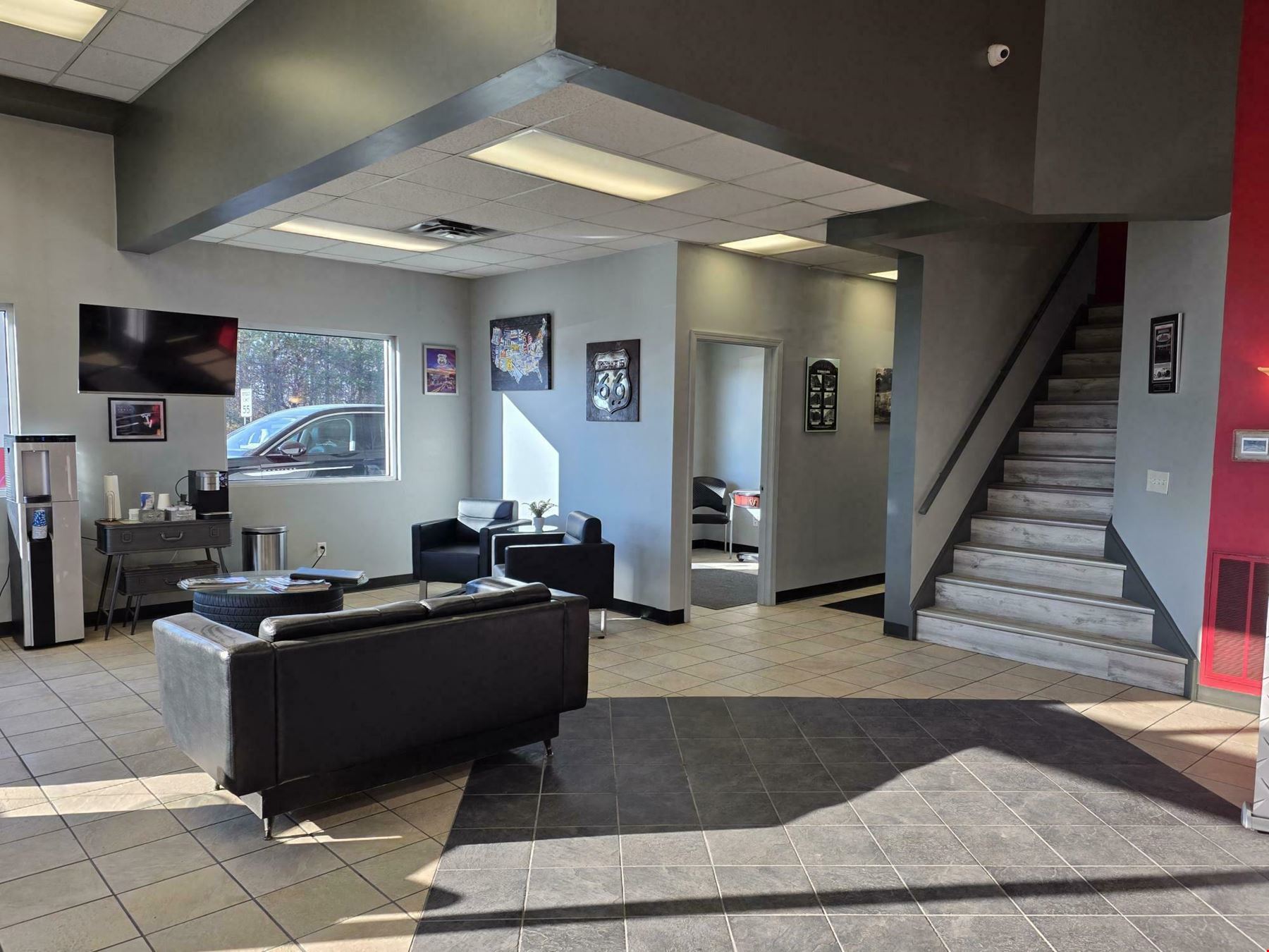 5967 Robinson Rd. - 80-vehicle paved & lighted parking lot with 1,000+/- SF of office/showroom space