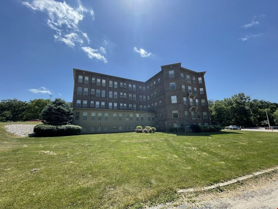 18-Unit Apartment Complex and Church