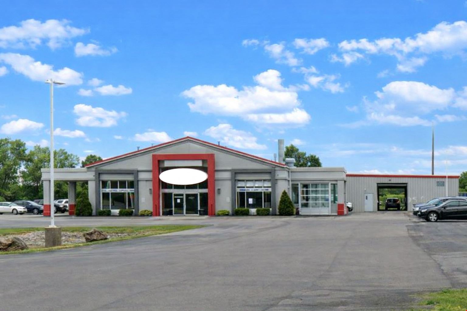 5967 Robinson Rd. - 80-vehicle paved & lighted parking lot with 1,000+/- SF of office/showroom space