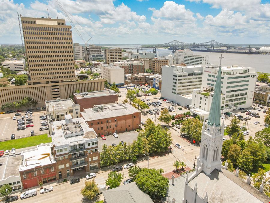 New Price: Gras Town Plaza - Office Building & Parking Lot in Downtown