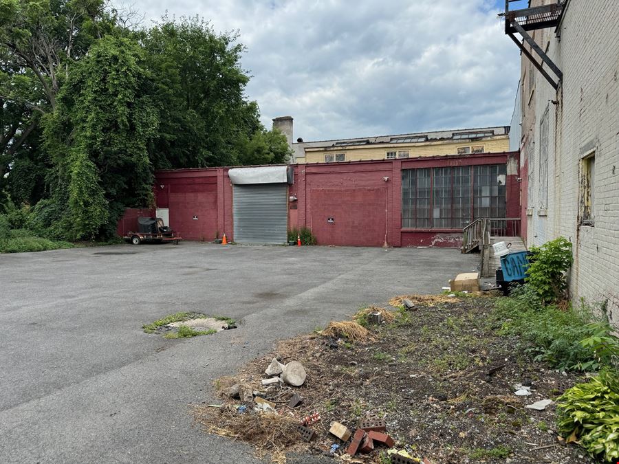 Syracuse Mixed-Use Corner Building – Retail Income + Residential Conversion